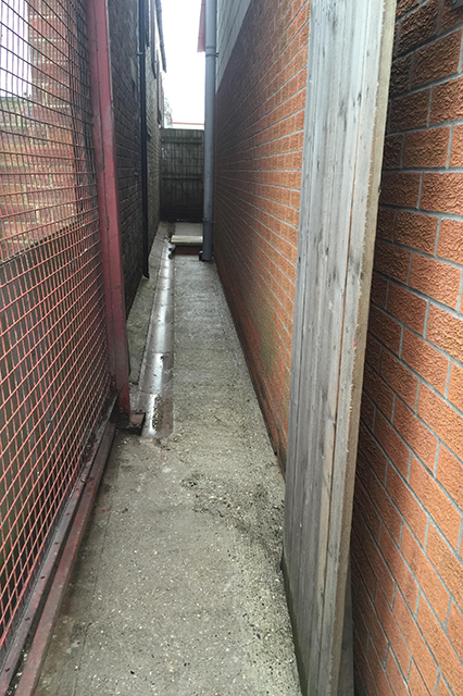 After image showing clean alleyway between buildings