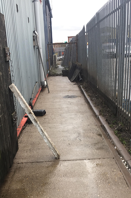 After phot of alleyway showing the area cleaned.