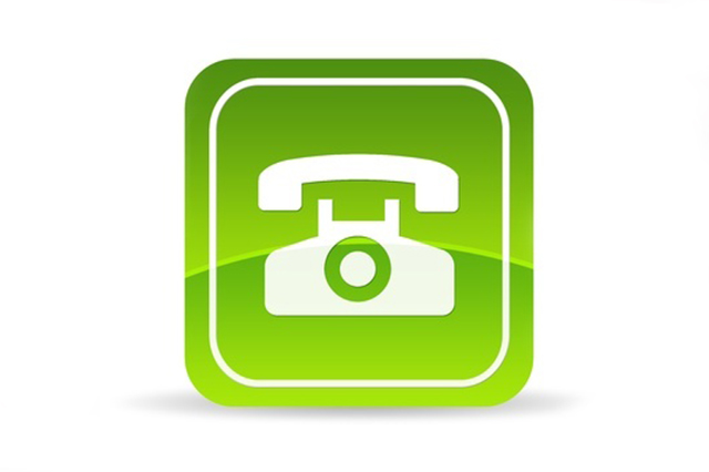 White Telephone graphic on green background